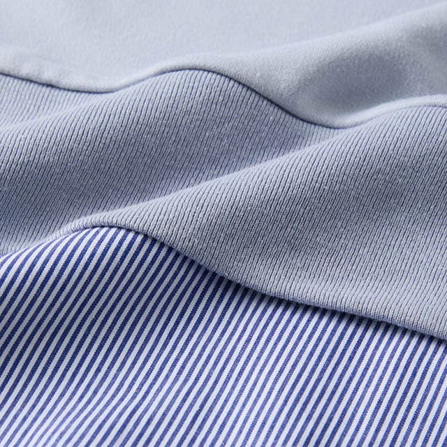 光沢感のあるポンチ素材でカジュアル見えしすぎない