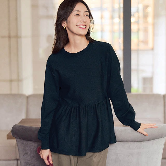 上品な可愛さと高級感のあるペプラムニット