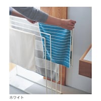 横からスッと掛けられる。