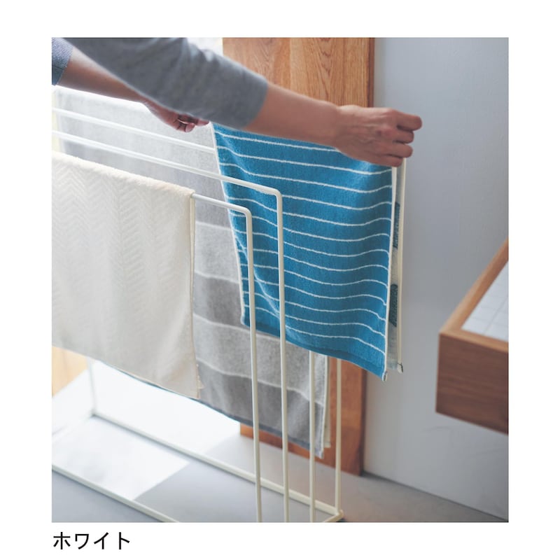 横からスッと掛けられる。