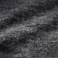 毛布のような肌触りの裏シャギー素材。熱を閉じ込めやすく保温性があるのも特徴