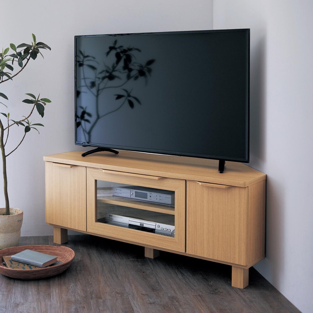 インテリアになじむシンプルなコーナーテレビ台フラップ式のガラス扉は閉じたまま中のデッキをリモコン操作できます両側の扉内はルーターやDVDの収納にピッタリ扉内には配線に便利なコード穴付き丸みのある天然木