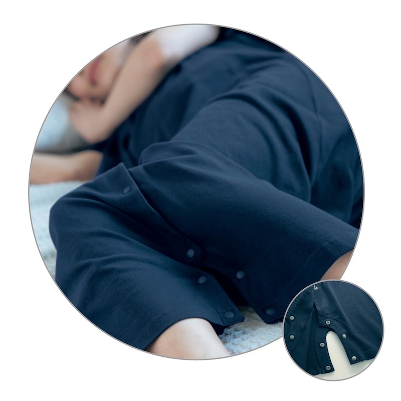 スナップボタンを留めれば、裾がまくれ上がりにくい。