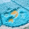 マットにはゴールド調のアリエル刺繍