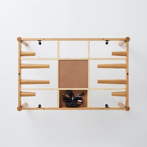 使わない継ぎ脚や、ヒーターのコントローラーは天板下にすっきり収納できます