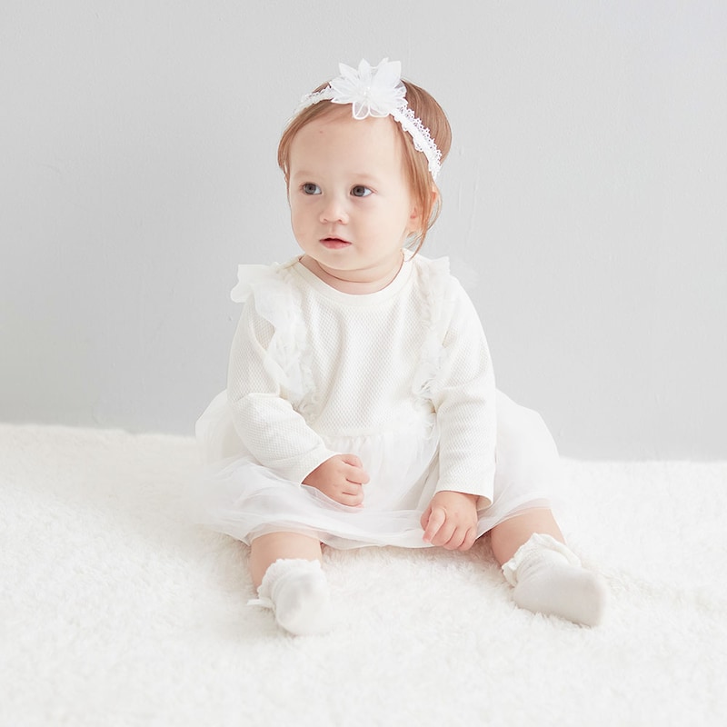 オフホワイト／モデル身長72㎝・70サイズ着用・体重8.5㎏