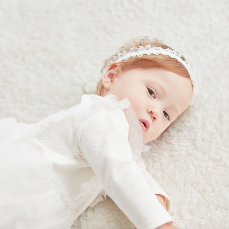 オフホワイト／モデル身長72㎝・70サイズ着用・体重8.5㎏