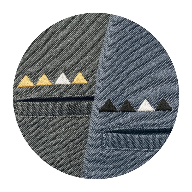 後ろポケット口には鈴木ともこさんコラボデザインの山の刺繍入り