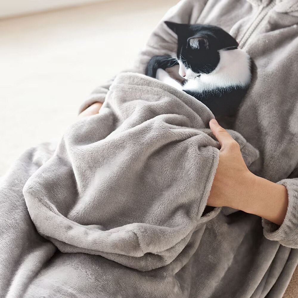 前ポケットの両サイドにはペットを直接撫でられる穴が開いています。