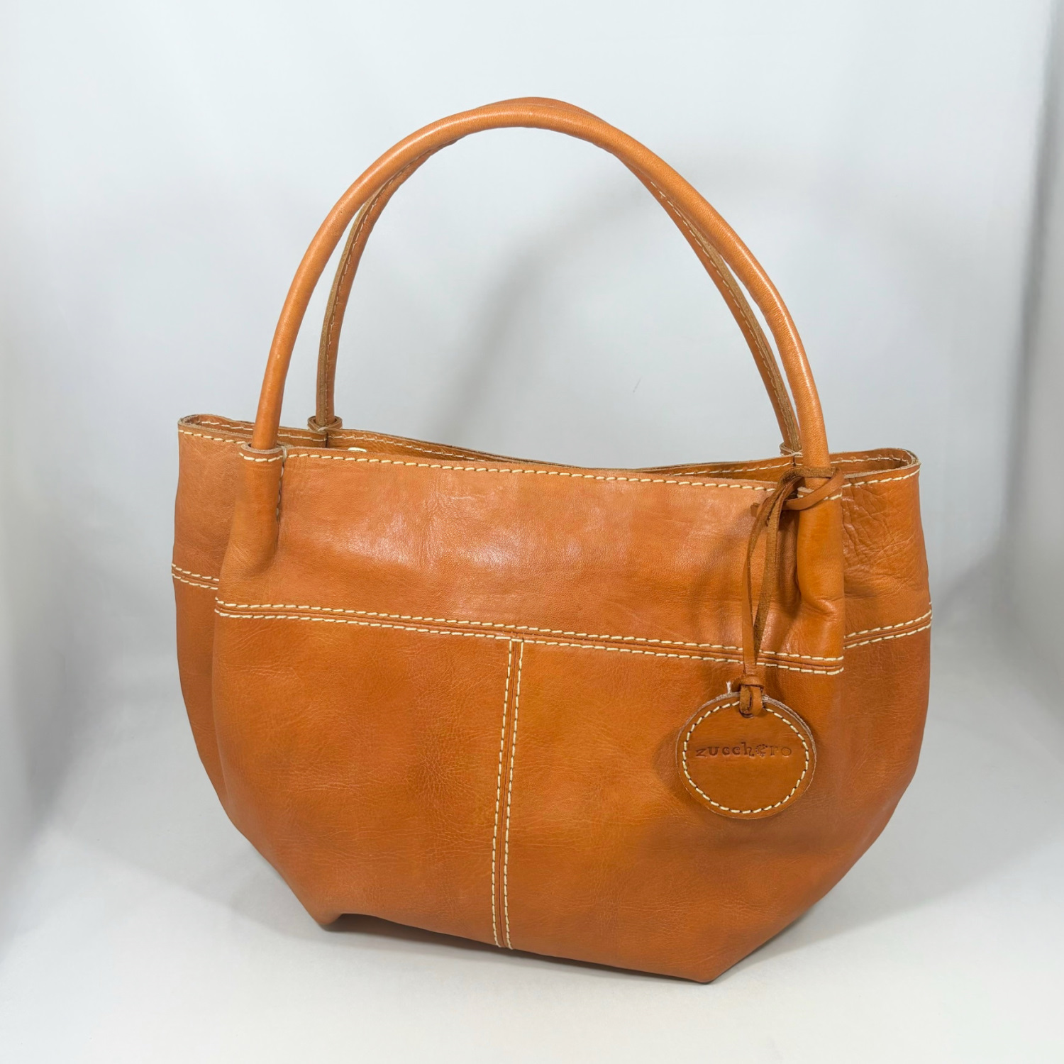 【ズッケロ/zucchero】ナチュラルな風合いの本革トートバッグ