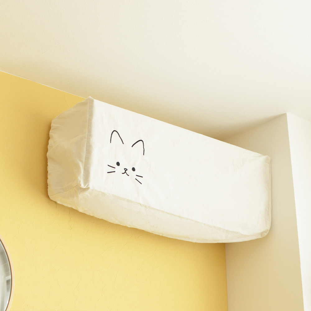 シーズンオフもかわいい 猫のエアコンカバー