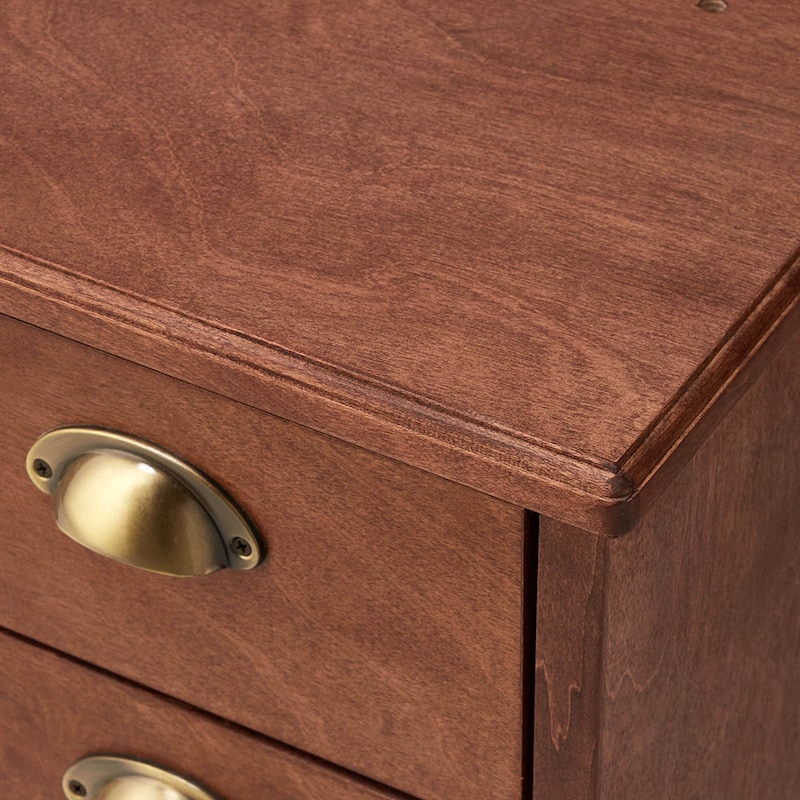 天板のエッジは溝を彫りこんで角を落とした仕上げ