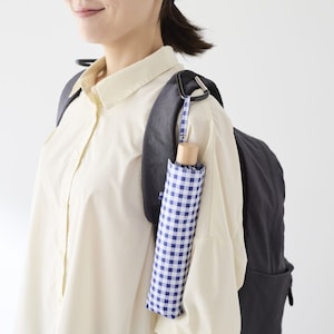 持ち手に腕も通らない、でも出し入れ頻繁だから片付けるのは面倒な日傘もこの通り！
