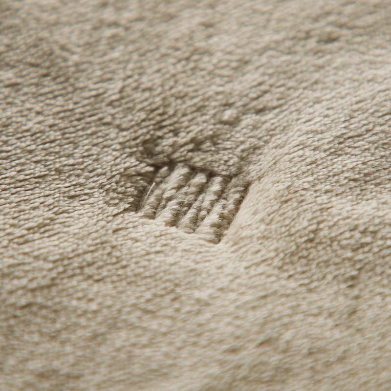 キルトを点留めにすることで、見た目がすっきり