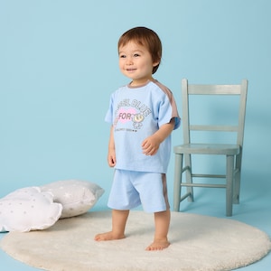 サックス／モデル身長78.5cm・80サイズ着用・体重9.9kg