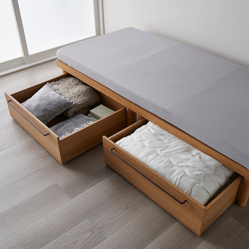 高さ25cm／シーズンオフの寝具やクッションなどをたっぷり収納できます