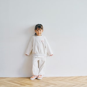 モデル身長105cm、110サイズ着用
