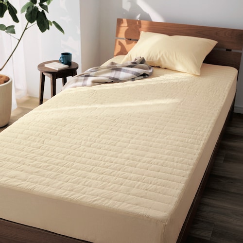 洗いをかけた綿素材のボックスシーツ敷きパッド