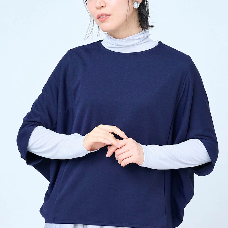 体型を拾いにくいコクーンシルエット