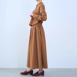 モデル身長168cm／M ※写真は撮影用のため着丈+6cmになります。