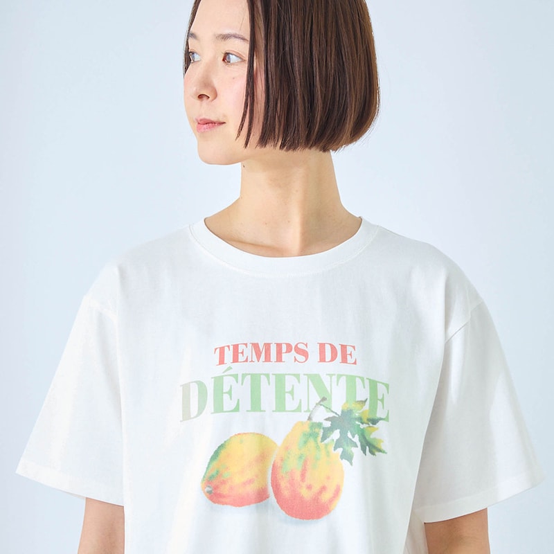 鮮やかなオレンジ＆グリーンで描いたフルーツ柄がハツラツとした印象に