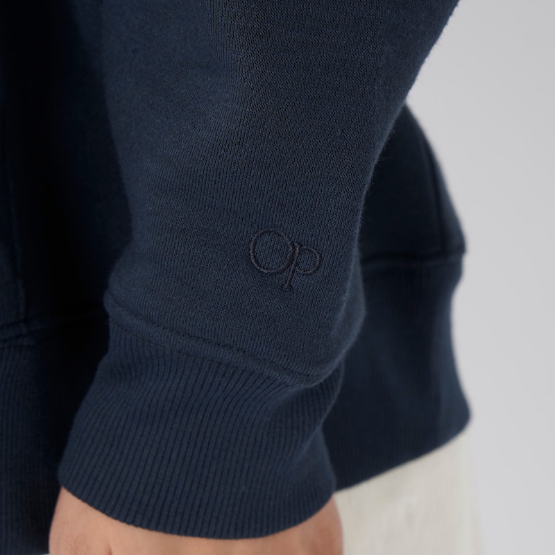 袖口に「ＯＰ」の刺繍ロゴあり