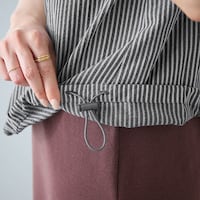 裾ストッパー付きでシルエット変化も楽しめる