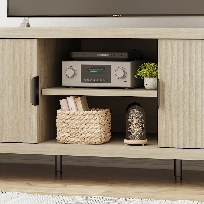 デッキなどが収納できる可動式棚板付きのオープン部