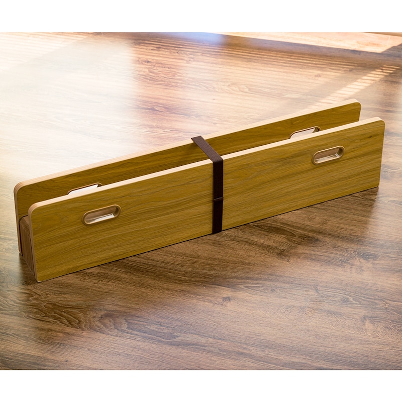 折りたたみ固定バンド付き、持ち手があるので移動もラクラク