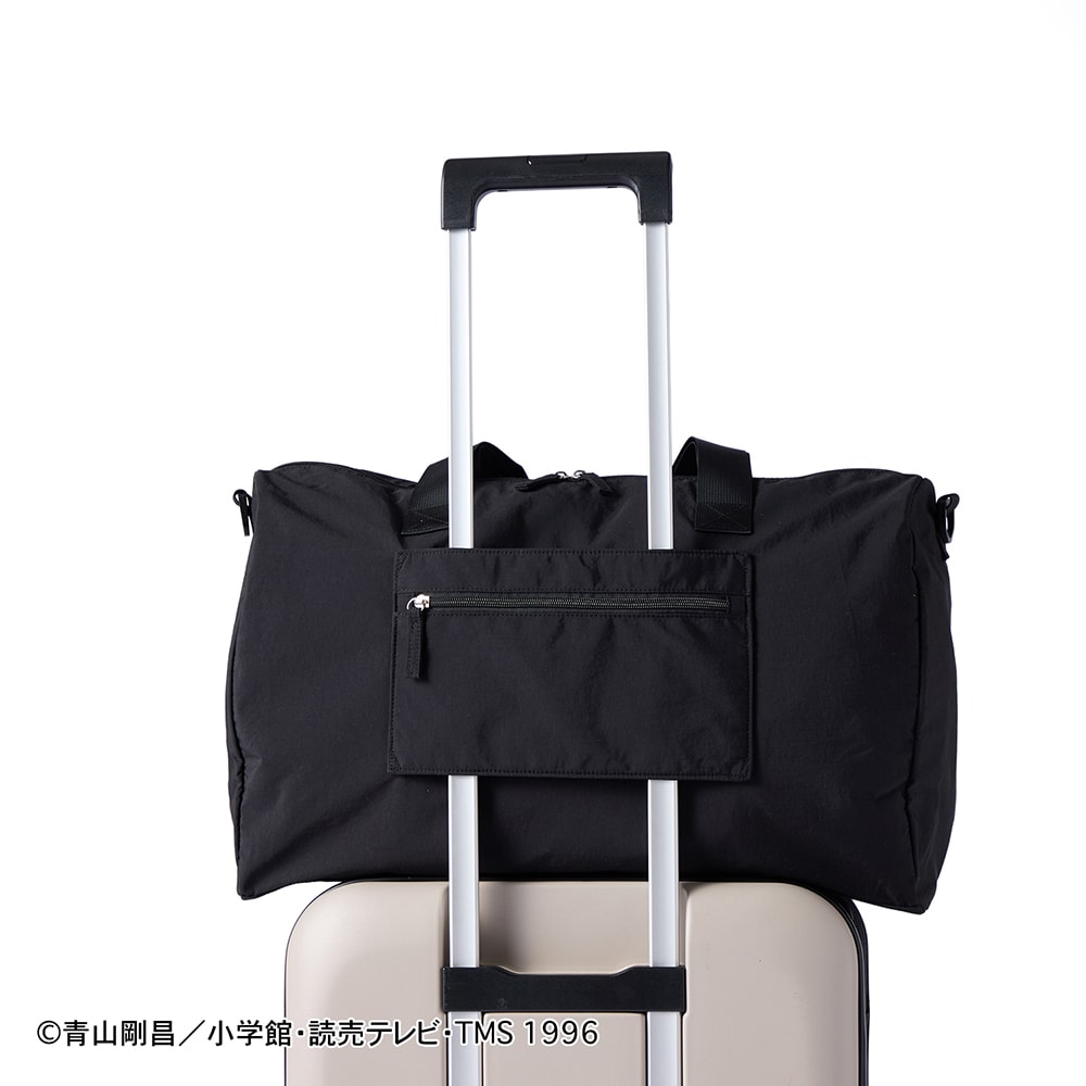 キャリーケースのバーに固定して運べます。